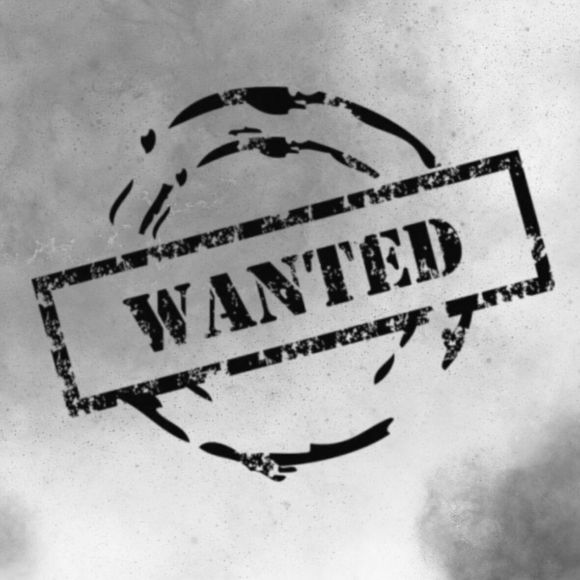 Schwarzer WANTED-Stempel als Platzhalter für eine offene Stelle im Studio.
